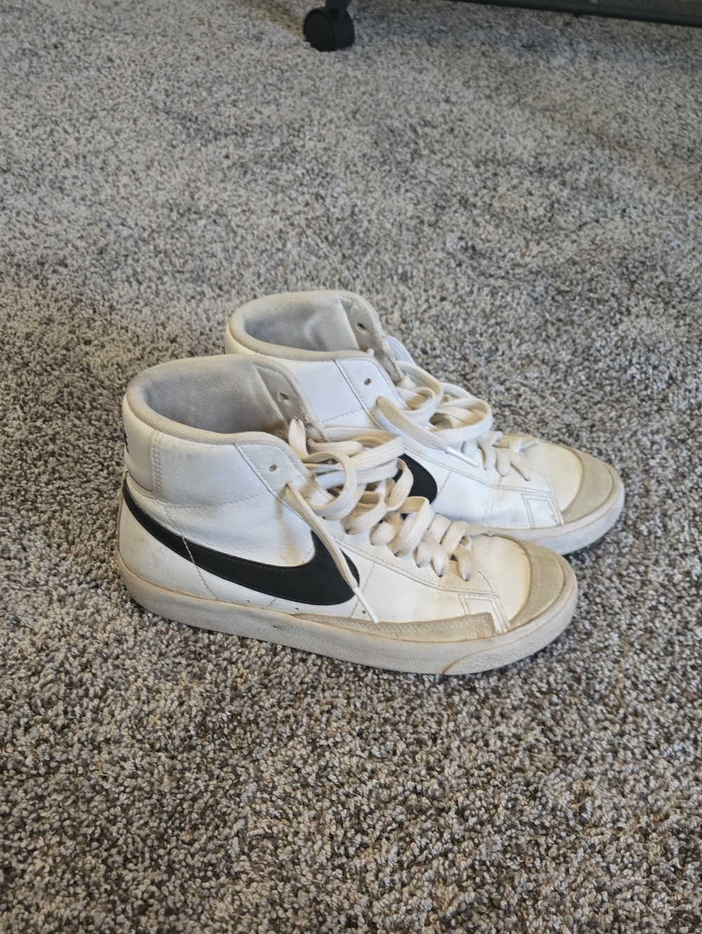 Nike White High-Top Sneakers with Black Swoosh Accents